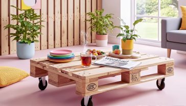 A hyper-realistic, professional photograph in the style of a Grand Designs Magazine feature. The image shows a stylish, rustic pallet wood coffee table as the centrepiece of a cosy, modern British living room. On the table is a steaming mug of tea and a copy of a weekend newspaper. In the background, there's a hint of a feature wall made from the same pallet wood, and soft, natural light is streaming in from a window overlooking a green garden. The mood is warm, aspirational, and achievable.