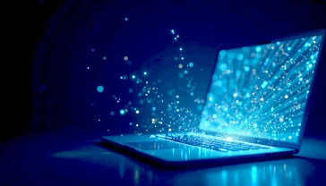 A hyper-realistic, professional photograph with a clean, modern aesthetic, in the style of a tech explainer feature for Wired magazine. The image shows a glowing, abstract network of interconnected light streams, representing data pieces, converging from multiple points onto a sleek, modern laptop screen in the centre. The background is a dark, deep blue, creating high contrast. The mood is informative, sophisticated, and technological, capturing the essence of a decentralised P2P network in a visually striking way. There are no people in the image.